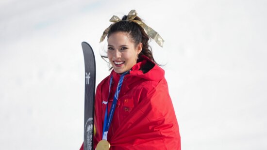 Gold medalist Eileen Gu, of China celebrates winning the women's freestyle skiing halfpipe final at the 2026 Winter Olympics, in Livigno, Italy, Feb. 22, 2026.