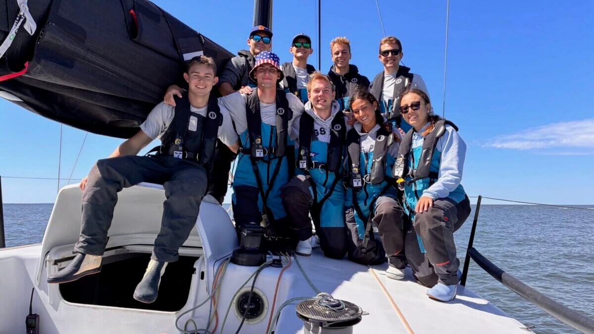 Calvin Marsh (left) and his sailboat crew.