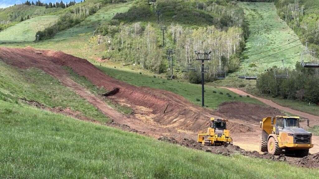 Construction crews shape Park City Mountain’s new 22-foot superpipe, part of the resort’s recent terrain park investments. The halfpipe is expected to return for the 2026-27 ski season.