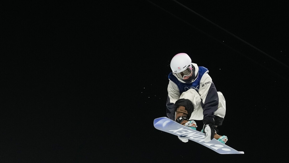 Japan's Yuto Totsuka competes during the men's snowboarding halfpipe finals at the 2026 Winter Olympics, in Livigno, Italy, Feb. 13, 2026.
