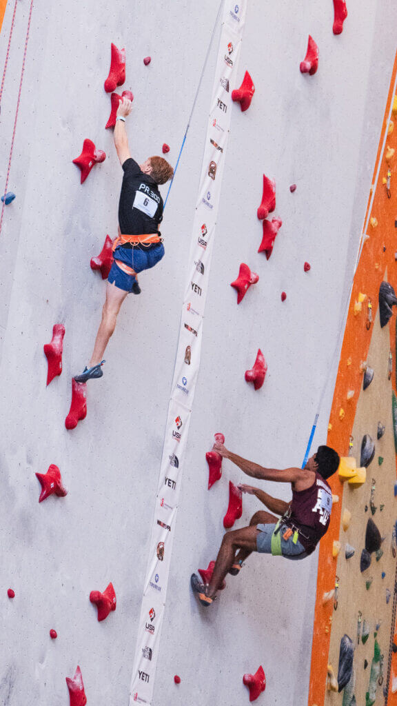 U student Logan Miner (left) competes in the 15-meter advanced men’s speed final.