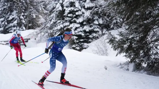 Campbell Wright, of the United States, right, competes in the men's 4x7.5-kilometer relay biathlon race at the 2026 Winter Olympics in Anterselva, Italy, Feb. 17, 2026.