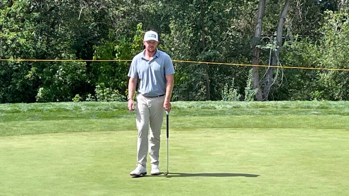 Mitchell Schow playing golf at the country club hosting the Utah Championship in which he's competing this week.