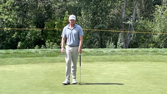 Mitchell Schow playing golf at the country club hosting the Utah Championship in which he's competing this week.