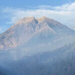 Smoke swirls around Mount Timpanogos as the Timp Fire burns Friday morning.
