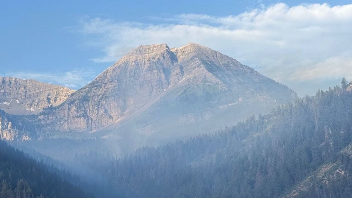 Smoke swirls around Mount Timpanogos as the Timp Fire burns Friday morning.
