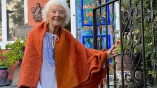 Artist Pilar Pobil stands outside Casa Pilar, the Salt Lake City home she transformed over six decades into a vibrant, immersive work of art.