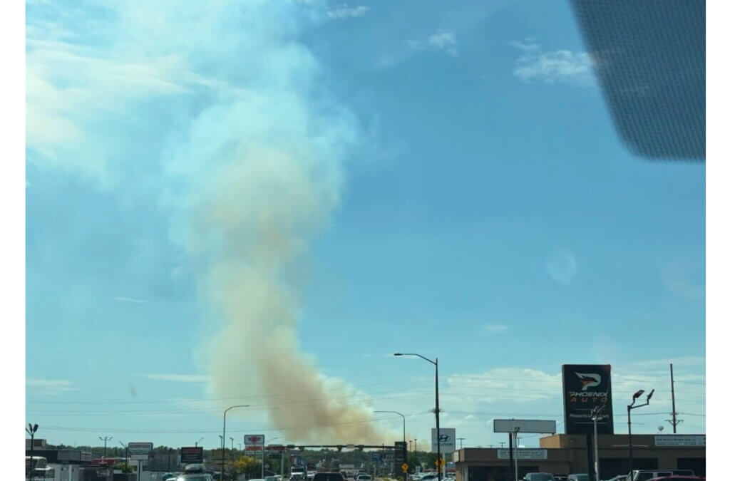 Smoke rises from the Adams Fire near Washington Terrace in Weber County as firefighters respond to the growing wildfire.