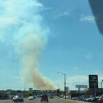 Smoke rises from the Adams Fire near Washington Terrace in Weber County as firefighters respond to the growing wildfire.