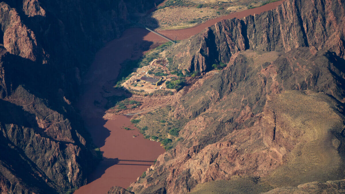 Bright Angel Canyon, the scene of flash floods, center right, merges with the Colorado River in the Grand Canyon, Monday, Aug. 31, 2026, at Grand Canyon National Park, Ariz.