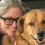 Journalist Michelle Deininger is pictured with her dog.