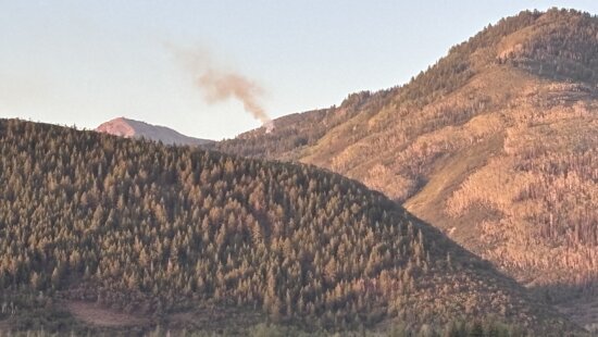 Smoke from a fire near Iron Mountain is visible from the Willow Creek area early Thursday morning.