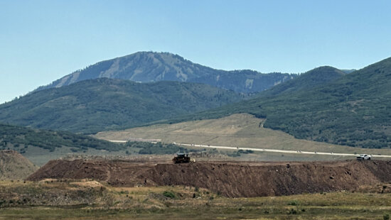 an excavator moves dirt at Richardson Flat on Monday August 3, 2026.