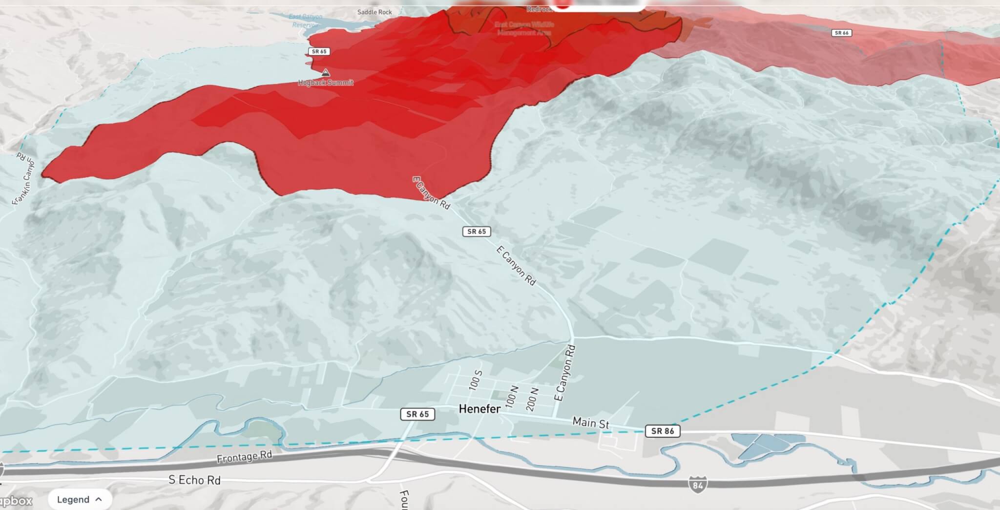 A map shows the Rocky Canyon Fire perimeter, in red, burning toward Henefer as of Sunday night, Aug. 9, 2026.