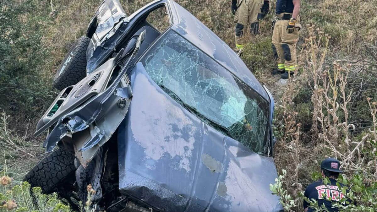 A vehicle rolled off the highway after a crash on US-189.