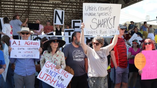 Community members protest ahead of a special Box Elder County Commission meeting to discuss the Stratos project, a massive data center proposed for an unincorporated area in Box Elder County, Utah, on May 4, 2026.