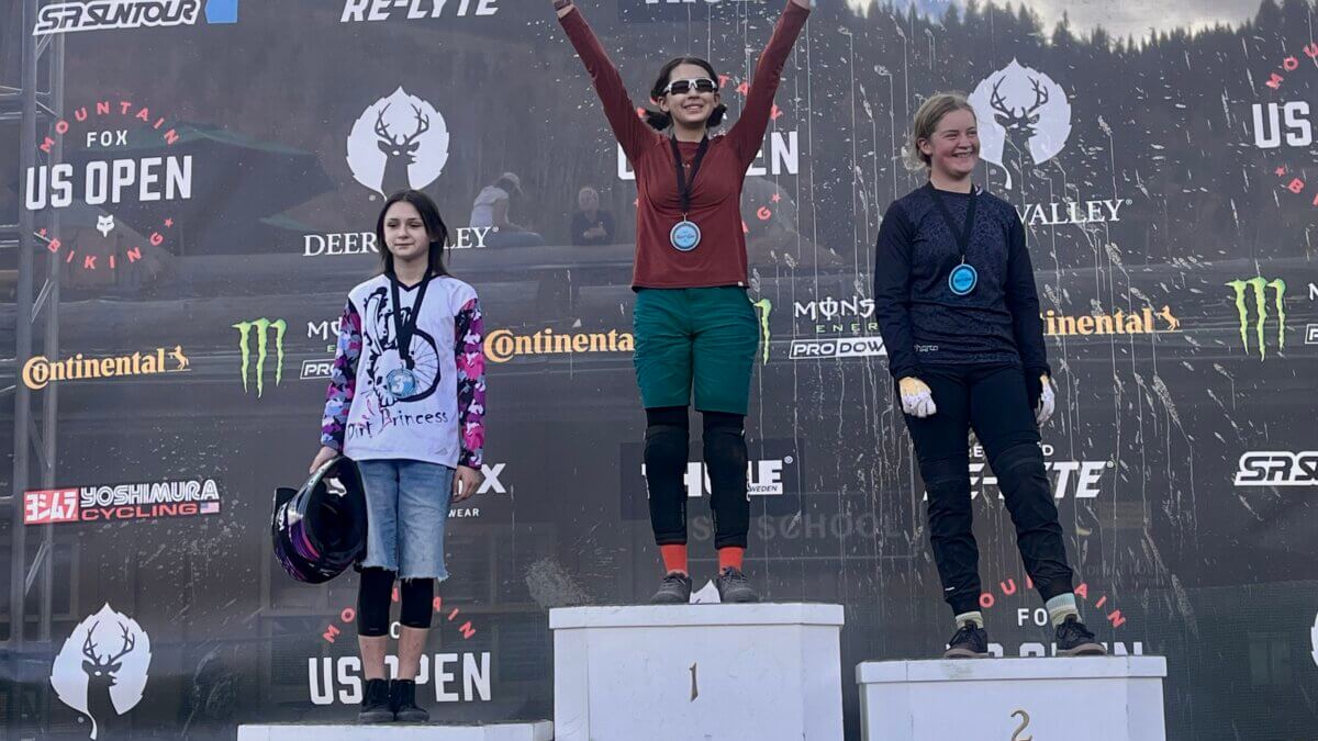 Park City athlete, Zoe, tops a Youth, Girls, podium at Deer Valley for the mountain biking competition.