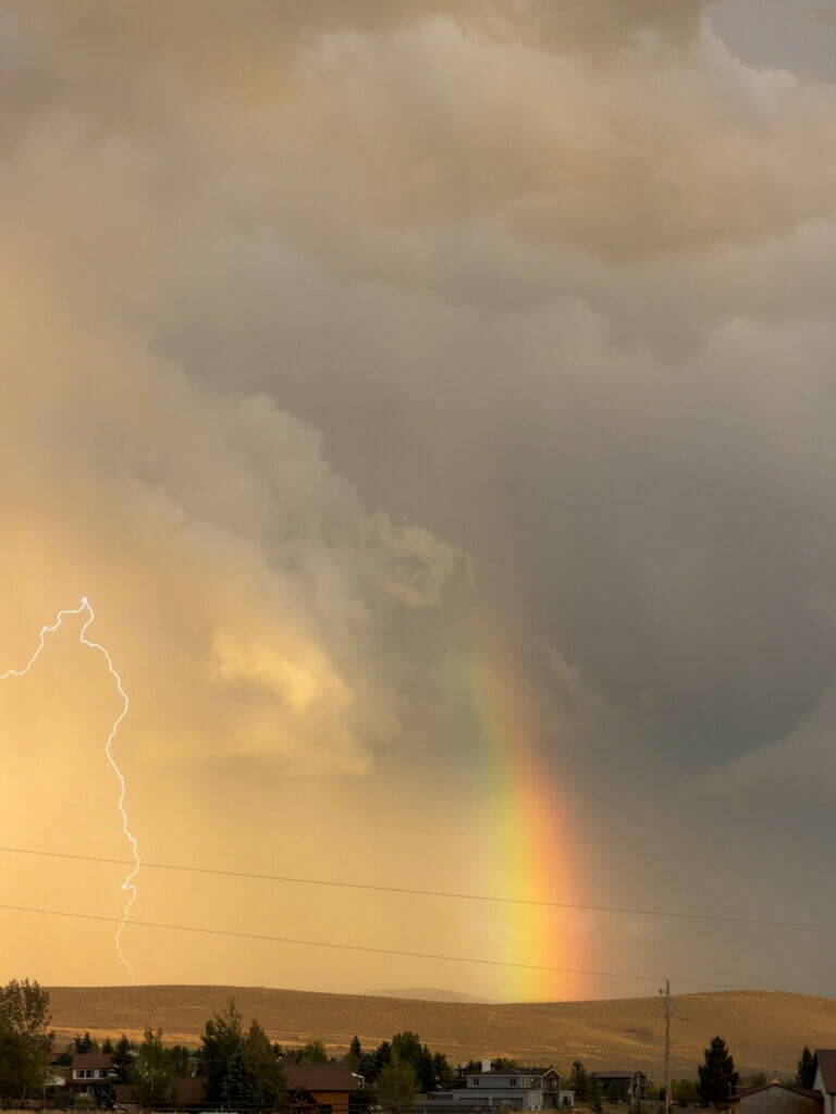 Rainbow and lightning occurring simultaneously over Silver Creek Estates during the storm passing through summit county 9/17/26.