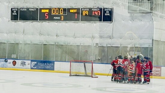 White Team celebrates their 5-1 win over Alta.