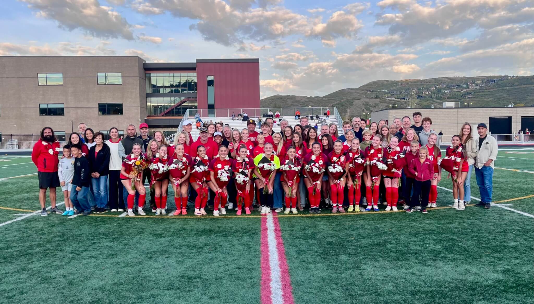 The players, parents, siblings, grandparents, and guardians of the PCHS Soccer Team gathered for Senior Night. Head Coach Anthony Dicicco is on the far left.
