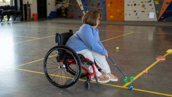 A participant practices putting during the National Ability Center’s four-week adaptive golf pilot program in Park City. The program introduced golfers with disabilities to the sport through adaptive equipment and individualized instruction.