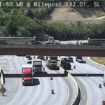 Crews work to fix a large pothole under the center median on I-80 through Parleys Canyon.