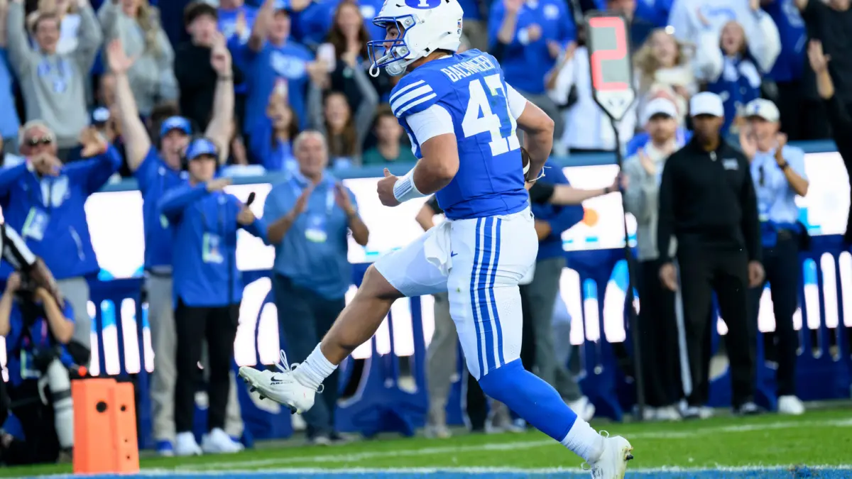 BYU quarterback Bear Bachmeier runs the ball in for a touchdown during the first half of an NCAA college football game against Notre Dame, Saturday, Oct. 17, 2026, in Provo, Utah.