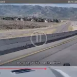 K9 Bruno begins his off-leash search on the U.S. 40 flyover ramp moments before jumping over the concrete barrier, in a still from dash camera footage released Wednesday.