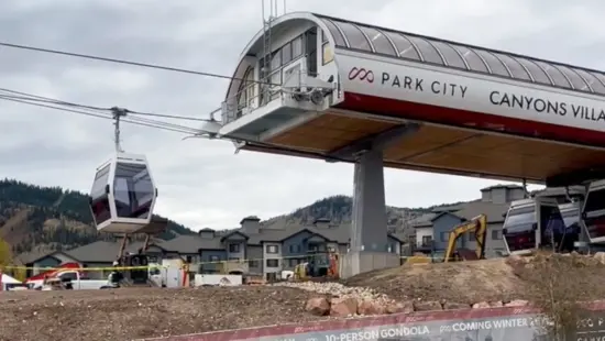 The first cabins of the Canyons Village Skyway cycle through the terminal near the new parking structure, 30 days ahead of Park City Mountain’s Nov. 20