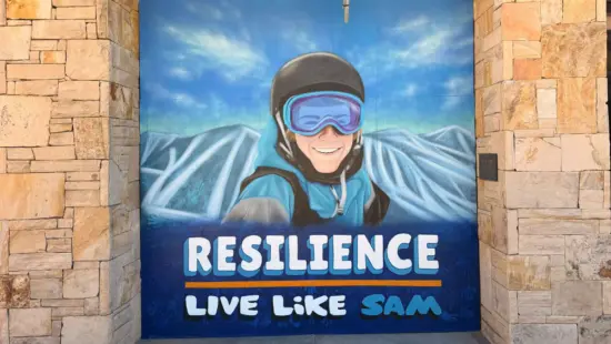 A new mural at Park City Mountain Resort depicts Sam Jackenthal and a message of resilience from the Live Like Sam Foundation.
