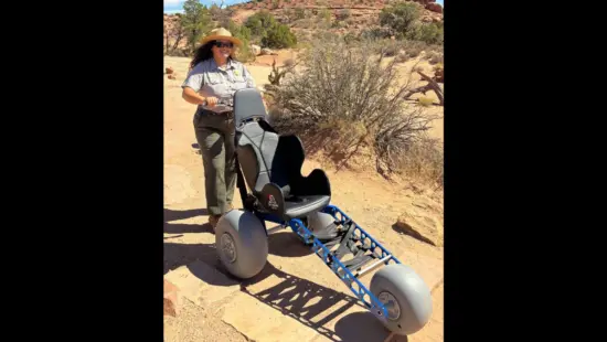 A ranger shows a new all-terrain wheelchair now available to rent at all Utah National Parks.